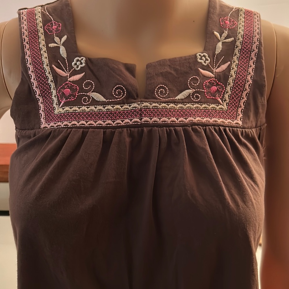 Brown embroidered cotton/polyester sleeveless shirt with tie on back.  Size M.